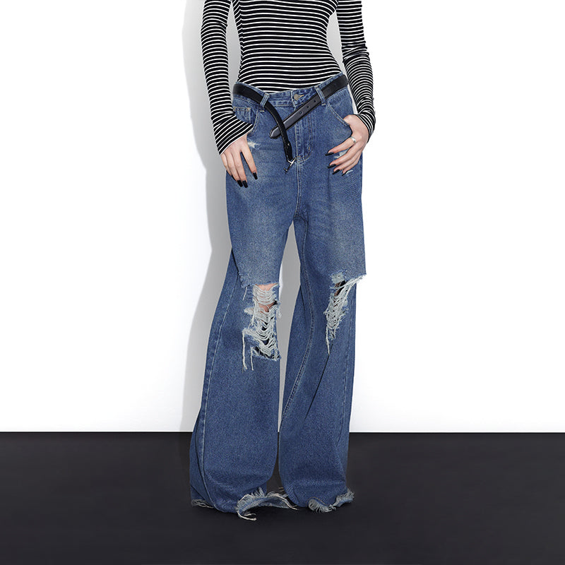 Distressed vintage mopping jeans