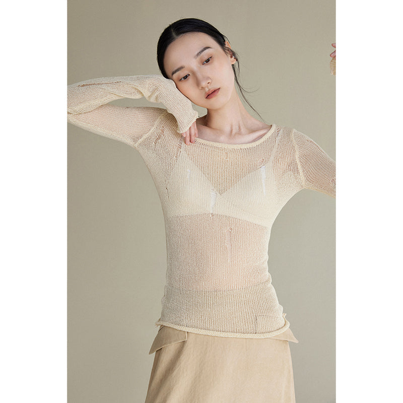 Streamlined irregular hole semi-transparent sweater