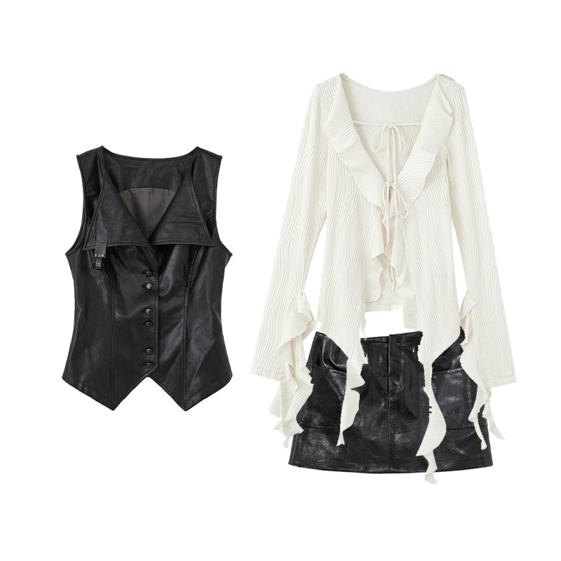 Ruffled top and leather vest and skirt